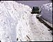 April 1973 Record Snowfall

A pickup negotiates Asbury Road near the current location of Sundown Ski Area. Mammoth snow plows had to be brought in from out-of-state to clear this area of Asbury Road.	 